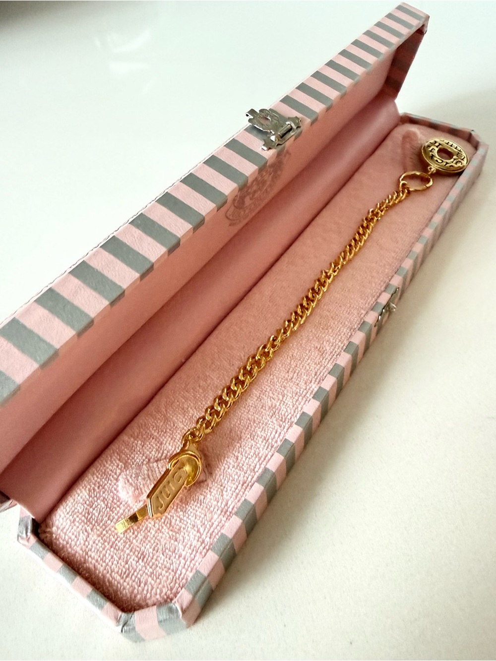 Juicy Couture Gold-Tone Chain Bracelet with Logo Charm. New in the box